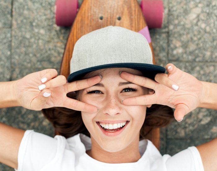 Young,Woman,With,Skateboard,Outdoors,Active,Lifestyle